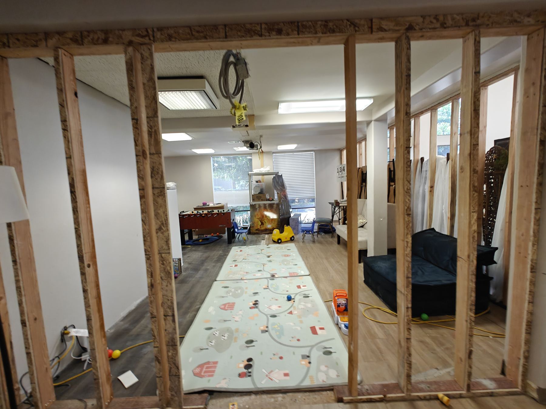 Renovation with a play rug in the hall