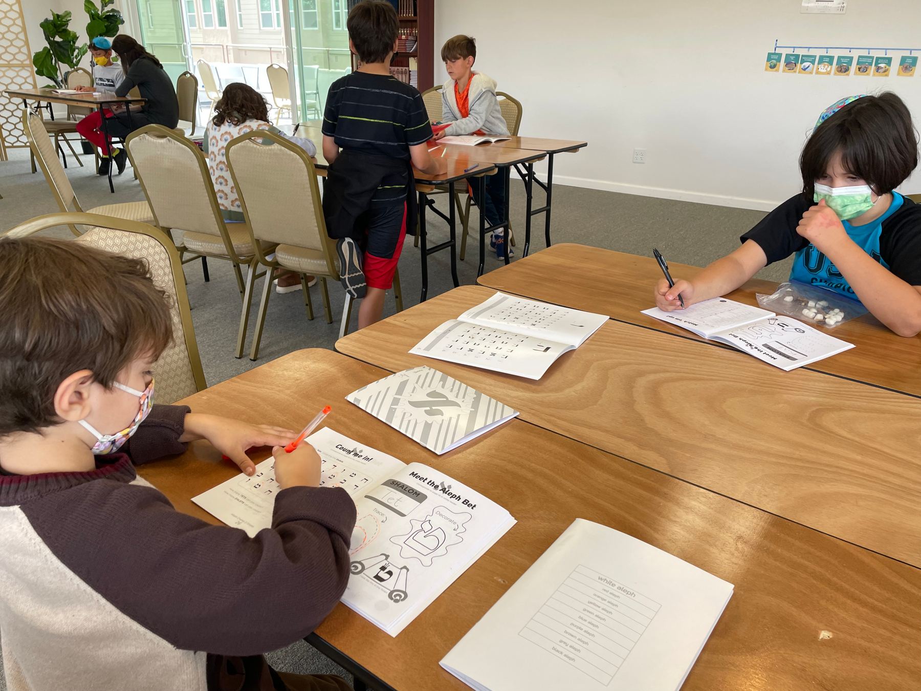 Students writing in class