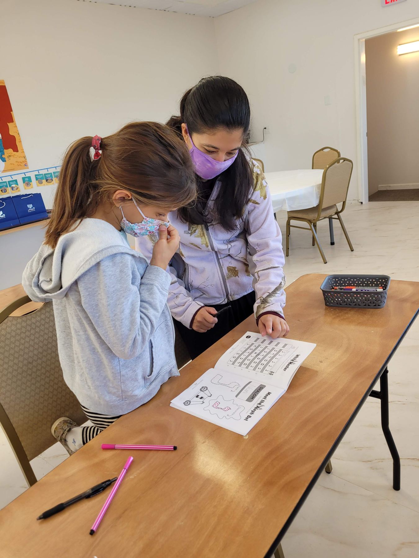 Two girls at a worksheet
